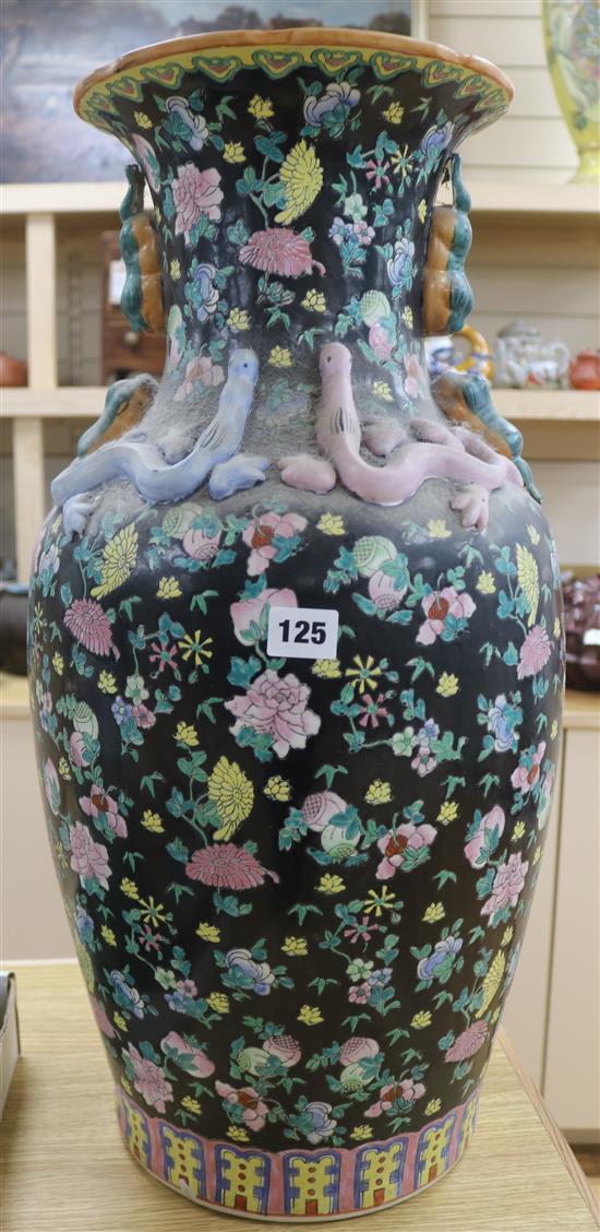 A large Chinese famille noire vase